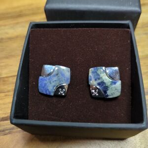 Silver-plated square cufflinks with sodalite gemstone inlay.